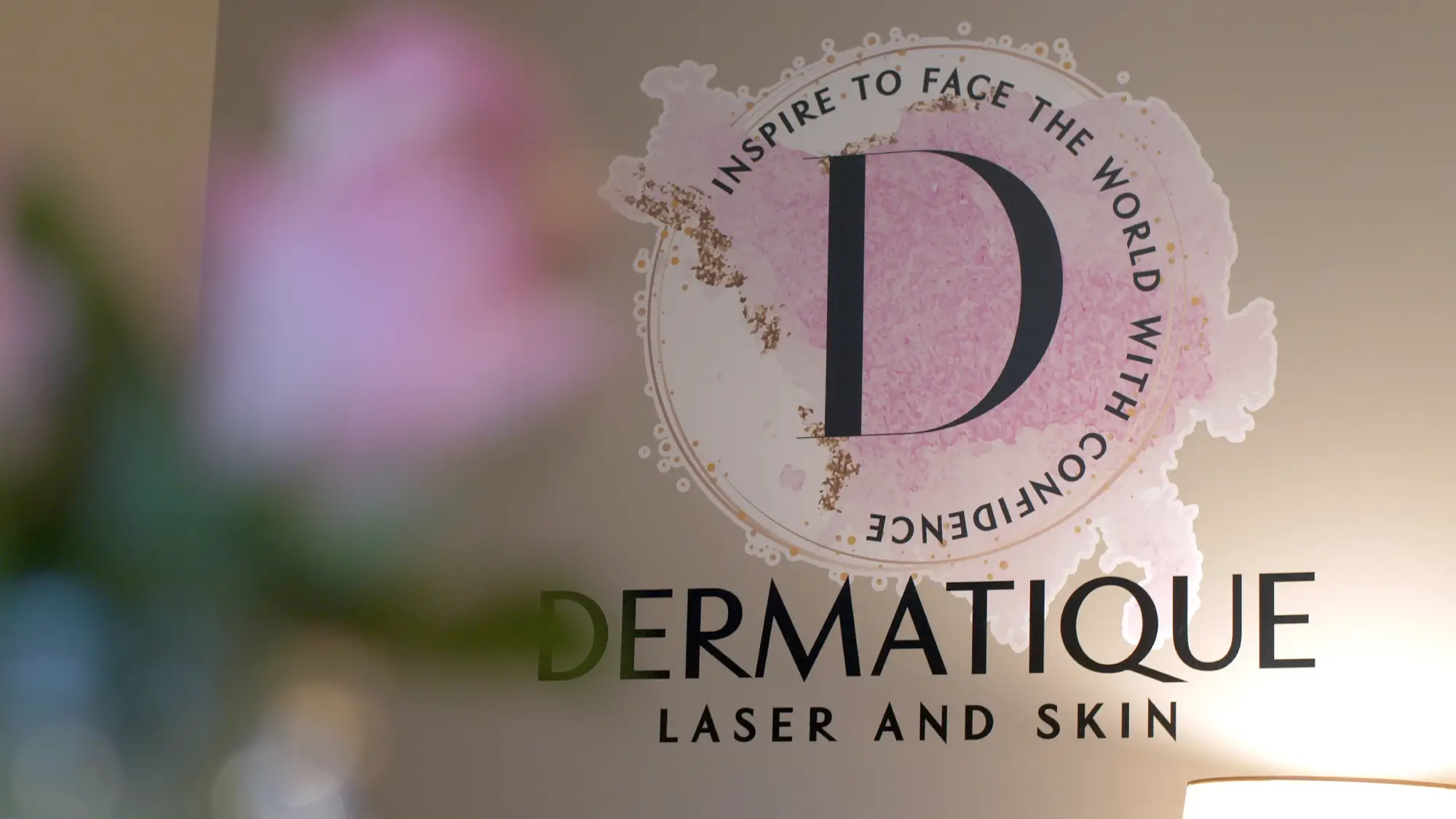 Dermatique Laser and Skin Logo on glass